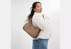 Terri Hobo Bag - Signature Canvas